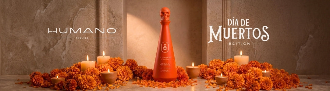 Humano reposado  on a dia de los muertos altar surrounded by marigolds and candles